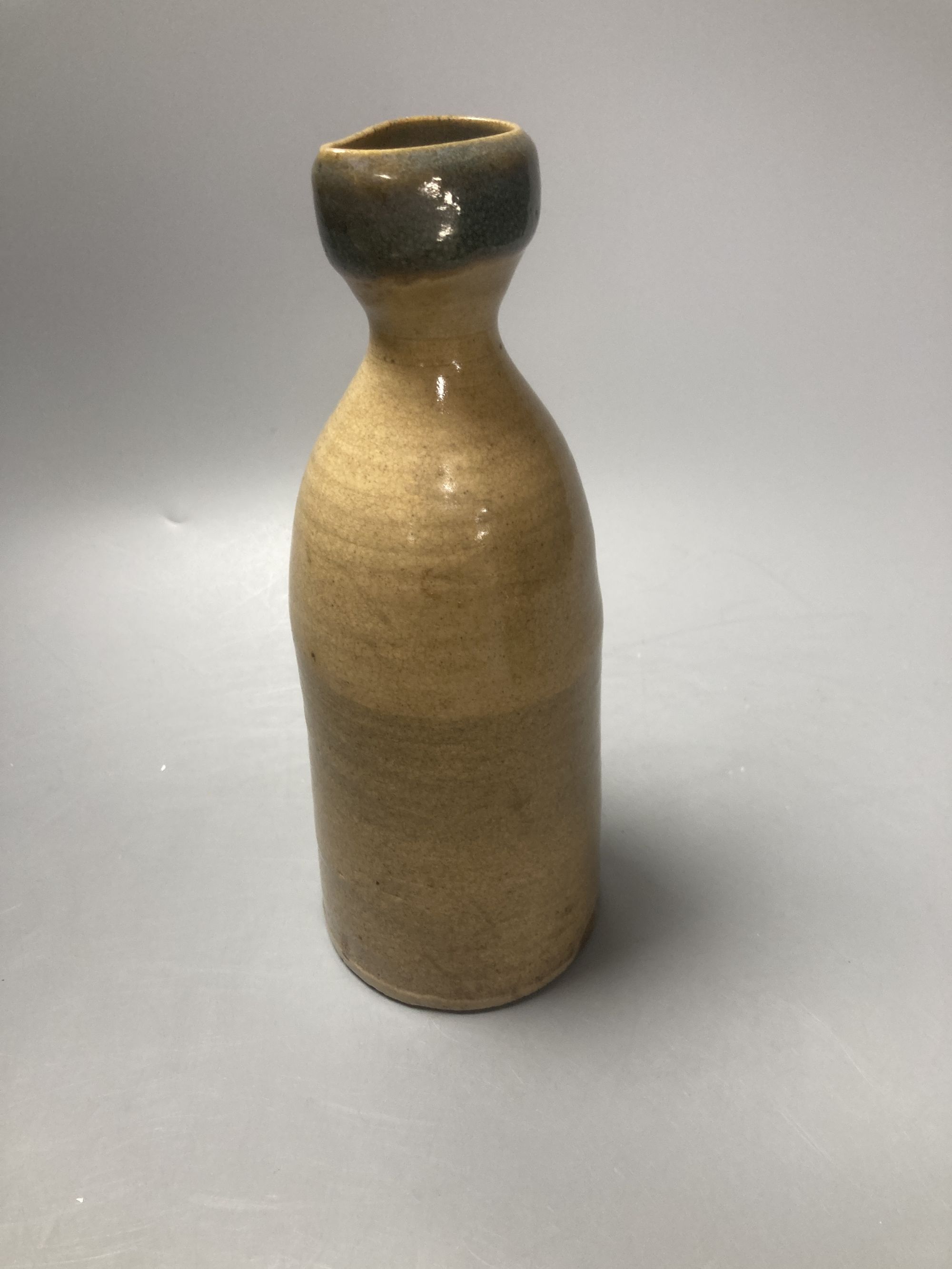 A Chinese pottery bottle, height 22cm, a cup and a vase